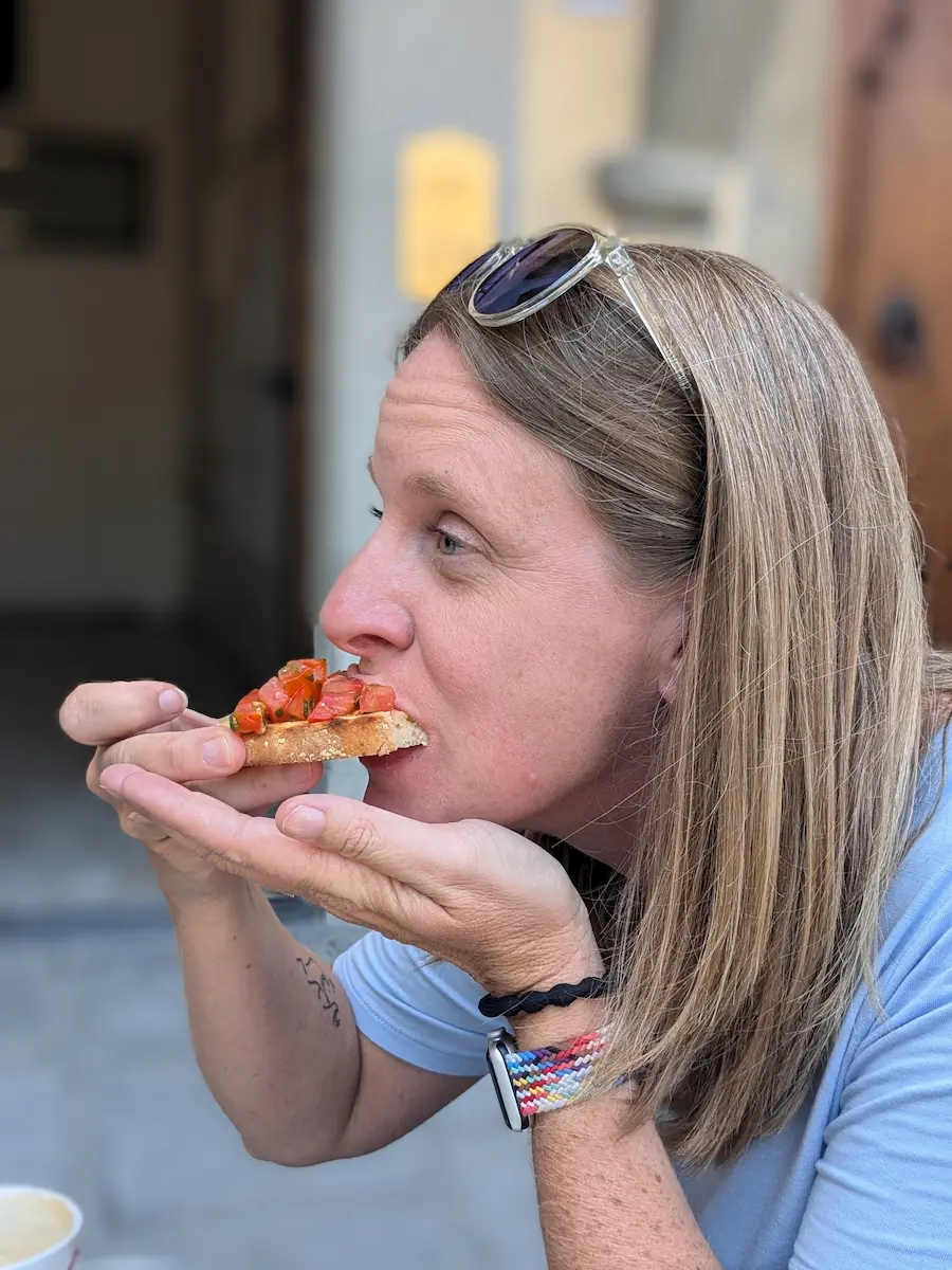 Enjoying a delicious bruschetta in Florence